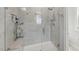 A glass-enclosed shower provides light and space for the perfect showering experience at 1008 Whistler St, Durham, NC 27713