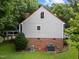 Aerial view of the house with red roof and HVAC units at 101 Joel Ct, Cary, NC 27513