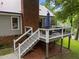 Back deck with stairs is shaded and includes outdoor seating at 101 Joel Ct, Cary, NC 27513
