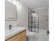 Modern bathroom featuring updated fixtures, a glass-enclosed shower, and decorative tile flooring at 101 Joel Ct, Cary, NC 27513