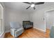Bright Bedroom with wood floors, a ceiling fan, and stylish furnishings at 101 Joel Ct, Cary, NC 27513