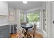 Charming breakfast nook with a round table, comfortable seating, and bright natural light at 101 Joel Ct, Cary, NC 27513