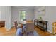 Bright dining area with a round table, seating for four, and a view of the outdoors at 101 Joel Ct, Cary, NC 27513
