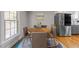 Cozy dining area features a round wooden table, seating for four, and natural light at 101 Joel Ct, Cary, NC 27513