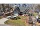 Charming home featuring a manicured front yard, an attached two-car garage, and a long driveway at 1013 Sagamore Dr, Louisburg, NC 27549