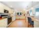 Spacious kitchen with cream colored cabinets, butcher block countertops, and cork floors at 108 High St, Carrboro, NC 27510