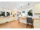 Bright kitchen featuring built-in breakfast bar with butcher block countertop and beadboard ceilings at 108 High St, Carrboro, NC 27510