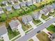 An aerial view of homes in the neighborhood, with well-maintained lawns and appealing community design at 120 Misty Grove Trail Trl, Franklinton, NC 27525