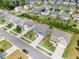 An aerial view of homes in the neighborhood with manicured lawns and inviting community layout at 120 Misty Grove Trail Trl, Franklinton, NC 27525