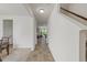 Bright entryway featuring neutral tile flooring and staircase at 120 Misty Grove Trail Trl, Franklinton, NC 27525