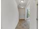 Well-lit entryway with tile flooring leading to carpeted area at 120 Misty Grove Trail Trl, Franklinton, NC 27525