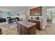 Open kitchen view into the living and dining area of the home at 120 Misty Grove Trail Trl, Franklinton, NC 27525