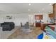 Open living space with dining area, living room, and kitchen, perfect for entertaining at 120 Misty Grove Trail Trl, Franklinton, NC 27525