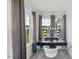 Vanity Room illuminated by natural light with modern makeup vanity and illuminated mirror at 120 Misty Grove Trail Trl, Franklinton, NC 27525