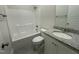 This bathroom has a granite vanity, a white toilet and a shower-tub combo at 129 Hot Springs Way, Benson, NC 27504