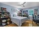 bedroom with hardwood floors, window with shutter style blinds, and ample natural light at 1426 Kildaire Farm Rd, Cary, NC 27511