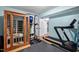 Home gym with a sauna, exercise machine, and access to other rooms at 1426 Kildaire Farm Rd, Cary, NC 27511