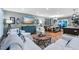 Cozy living room with stylish decor, featuring light colored furniture and hardwood floors at 1426 Kildaire Farm Rd, Cary, NC 27511