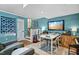 Living room with a TV, table, chairs and lots of entertainment options at 1426 Kildaire Farm Rd, Cary, NC 27511