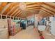 A spacious attic with wood beams and room for storage at 1701 Berwickshire Cir, Raleigh, NC 27615