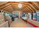 A large, unfinished attic with exposed wooden beams and ample storage space at 1701 Berwickshire Cir, Raleigh, NC 27615