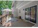 A charming back deck with a seating area, perfect for relaxing in the outdoors at 1701 Berwickshire Cir, Raleigh, NC 27615