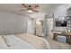 View of the bedroom, featuring neutral walls, white doors and a desk area for a cozy and inviting space at 1701 Berwickshire Cir, Raleigh, NC 27615