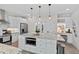 Contemporary kitchen featuring granite countertops, stainless steel appliances, and custom cabinetry at 1701 Berwickshire Cir, Raleigh, NC 27615