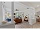 Spacious living room showcasing an open floor plan, wood floors, and abundant natural light at 1701 Berwickshire Cir, Raleigh, NC 27615