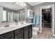 Bathroom features a double vanity, toilet, and walk-in closet at 1831 Devonridge Dr, Fuquay Varina, NC 27526