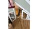 Charming pet nook under the stairs, offering a cozy retreat with secure door at 1831 Devonridge Dr, Fuquay Varina, NC 27526
