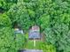 Aerial view of the home and lush green surroundings at 1907 Bivins St, Durham, NC 27707