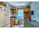Kitchen with abundant cabinet space and a window above the sink for ample natural light at 1907 Bivins St, Durham, NC 27707