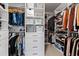 Walk-in closet with custom shelving and organized storage solutions at 199 High Woods Rdg, Chapel Hill, NC 27517