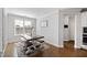 Cozy dining area with hardwood floors, built in bench seating, and large windows providing natural light at 199 High Woods Rdg, Chapel Hill, NC 27517