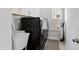 Functional laundry room featuring a modern washer and dryer, sink, and plenty of storage at 199 High Woods Rdg, Chapel Hill, NC 27517