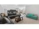 Large living area with ample seating and a cozy sectional sofa at 199 High Woods Rdg, Chapel Hill, NC 27517
