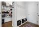 Mudroom featuring built in storage, hall tree and access to the pantry and back door at 199 High Woods Rdg, Chapel Hill, NC 27517
