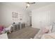Bright ' room features ample lighting, storage, and playful decor at 212 Golf Vista Trl, Holly Springs, NC 27540
