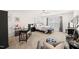 Primary bedroom with office space features ample lighting and stylish decor at 212 Golf Vista Trl, Holly Springs, NC 27540