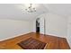 Bright room features hardwood floors, closet, and a chandelier at 2147 Wake Dr, Raleigh, NC 27608