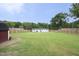 The large backyard, complete with a shed and patio, offers endless outdoor possibilities at 2320 Marks Creek Rd, Knightdale, NC 27545