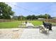 Enjoy the spacious backyard with a stone-lined patio, grilling area, and open lawn at 2320 Marks Creek Rd, Knightdale, NC 27545