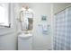 Light and airy bathroom with updated vanity and coordinated decor at 2320 Marks Creek Rd, Knightdale, NC 27545