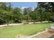 A well-manicured front yard with lush landscaping enhances the home's curb appeal at 2320 Marks Creek Rd, Knightdale, NC 27545