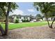 Quaint one-story house with a well-kept lawn, mature trees, and a neutral color scheme at 2320 Marks Creek Rd, Knightdale, NC 27545