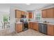 Functional kitchen featuring stainless steel appliances, cabinets, and countertop space at 2575 Primrose Ln, Creedmoor, NC 27522