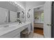 Bathroom with double sinks, vanity and view of the bedroom at 2637 S Nc 87, Graham, NC 27253