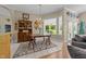 Charming dining area with ample natural light, traditional decor, and convenient access to other living spaces at 2637 S Nc 87, Graham, NC 27253