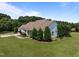 Beautifully landscaped home with a well-maintained yard and mature trees providing privacy at 2637 S Nc 87, Graham, NC 27253